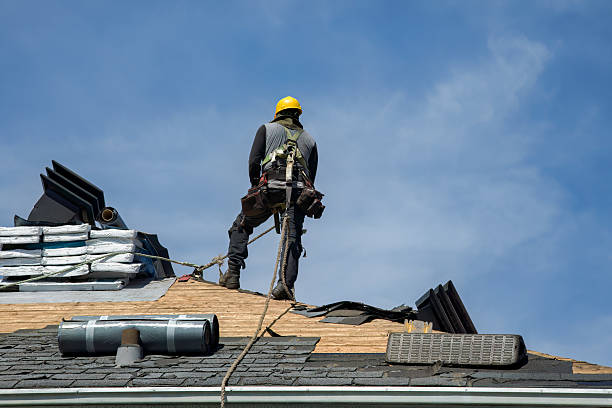 Professional Roof Replacement technician working in Pleasanton, KS